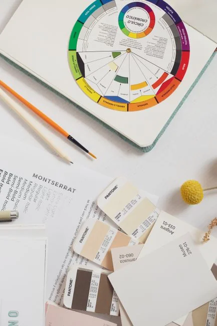 hero-img A contemporary workspace where hands review marketing data on a laptop alongside paper documents.